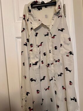 Torrid Black Logo Tag on Cream Garment